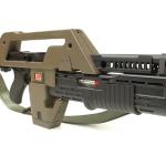 Custom build from a kit, working airsoft and pump.  Built in a custom grenade exposed by racking the pump back