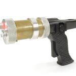 Laser wired to the trigger that emits through the acrylic emitter